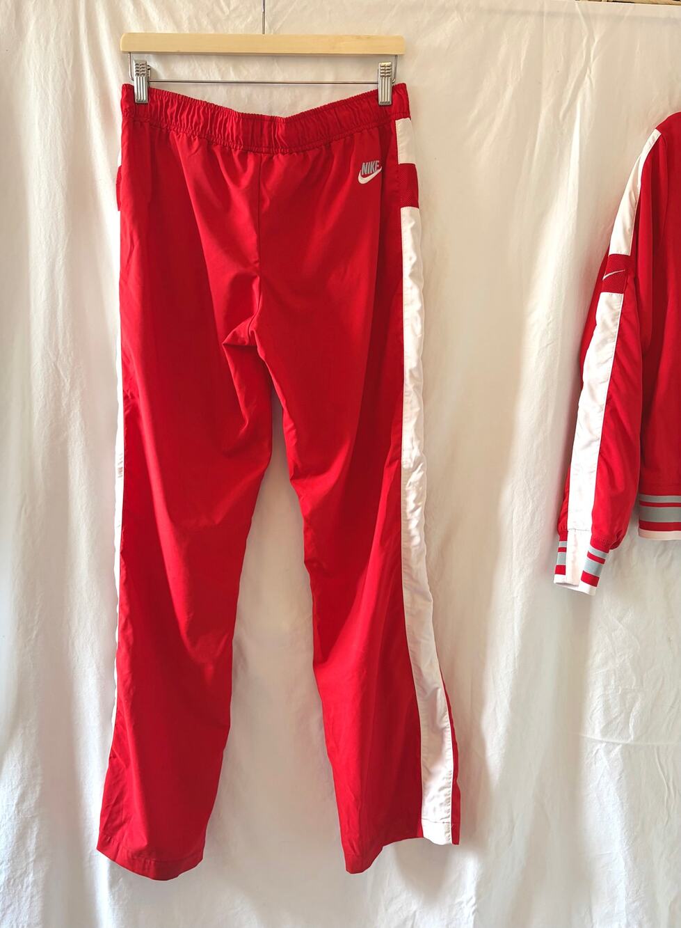 red nike track pants